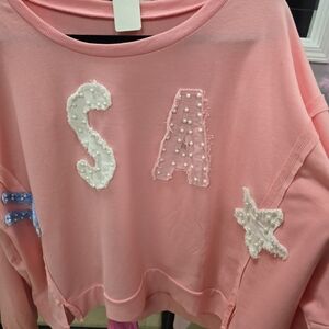 Pink Sweatshirt with Pearl Embellishments